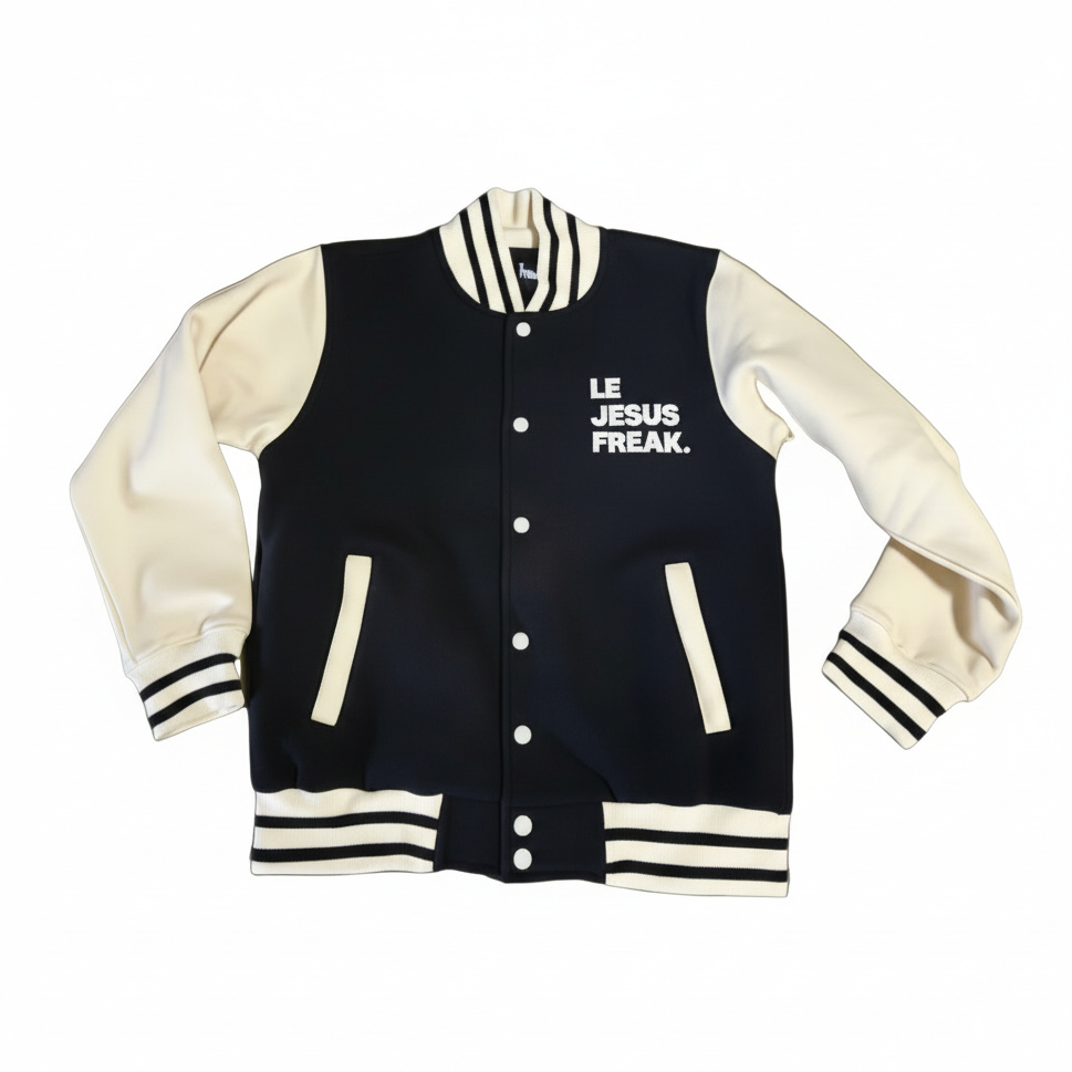 Black and cream varsity jacket Le JESUS FREAK. with text on a white background
