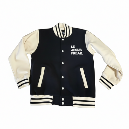 Black and cream varsity jacket Le JESUS FREAK. with text on a white background